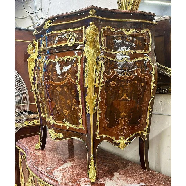 Beautiful copper dresser with gold leaf details. Stunning French commode. Has a beautiful gold leaf details. Elevate your...