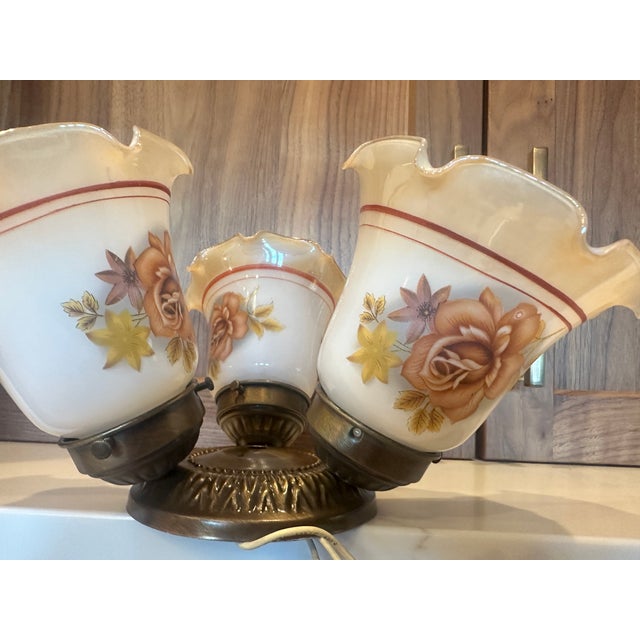 Add a touch of warm vintage charm to your home with this beautiful 1970s-era ceiling light fixture. Featuring creamy white...