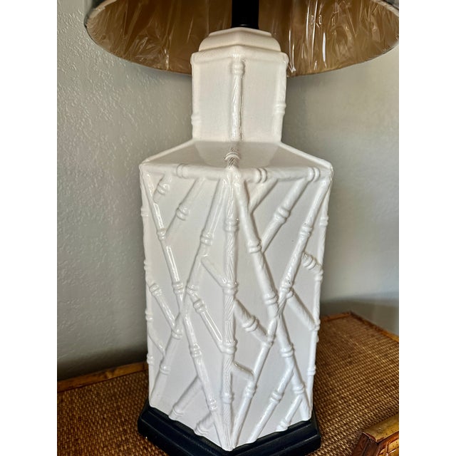 Wonderful Hollywood Regency Coastal style hexagon shaped white ceramic table lamp with a bamboo relief pattern sure to add...