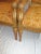 Beautiful pair of honey stained Isenhour chairs with gilded accents, carvings and nailhead trim. Chairs have original...
