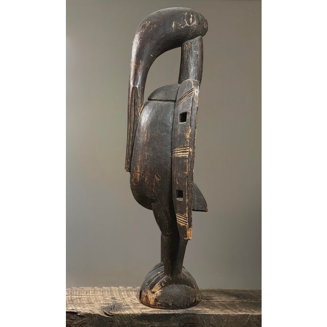 Large Antique Hand Carved Senufo Calao Bird Statue Artist: Unknown (Senufo Culture) Date: Early to Mid-20th Century...