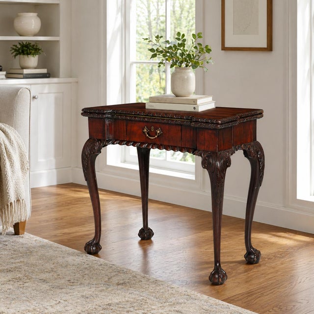 A FINE AND RARE GEORGE III FIGURED MAHOGANY GATE-LEG CARD TABLE OF DESIRABLE PROPORTIONS On ball-and-claw feet with...