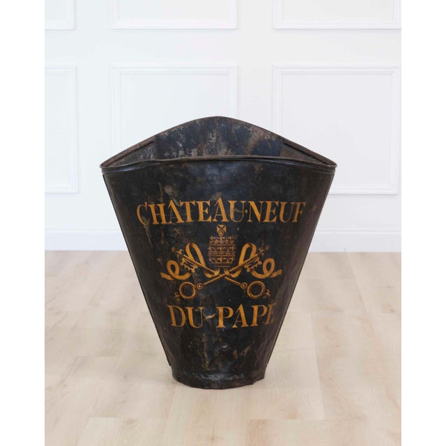Made in France around 1900, this grape-picking hod has later painted decoration. A hod of this type was a practical vessel...