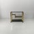 Italian modern brass and smoked glass cart, 1970s Cart with a brass frame and smoked glass shelves. The geometric...