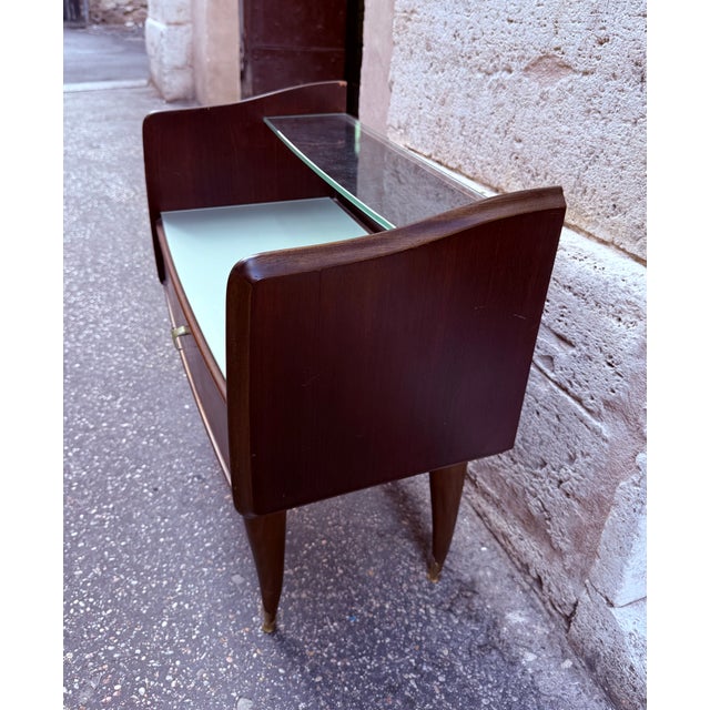Add a touch of sophisticated elegance and mid-century modern charm to your bedroom with this exceptional pair of original...