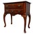 An elegant early 20th-century English side table, finely crafted from beech and distinguished by its decorative burr...