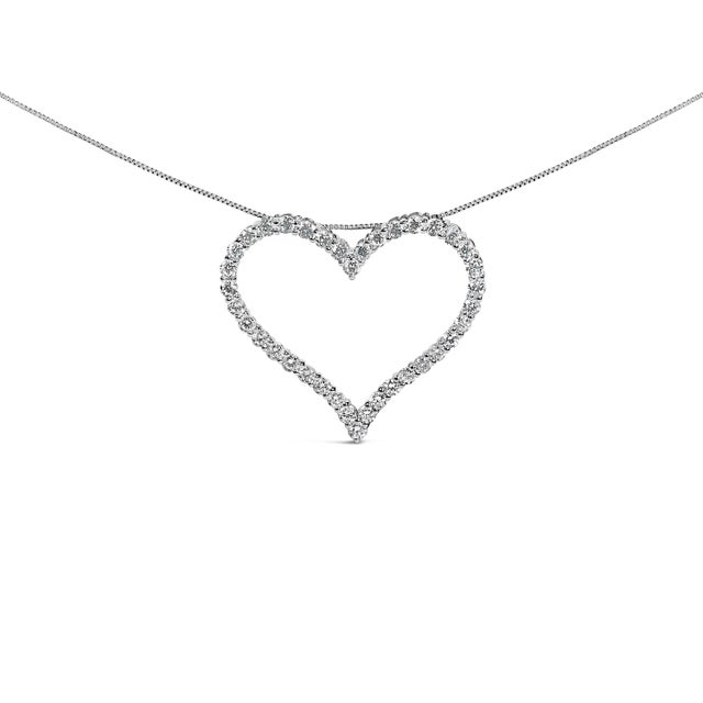 A luminous whisper of devotion, this open-heart pendant traces love’s graceful contour in 14K white gold, its bright...