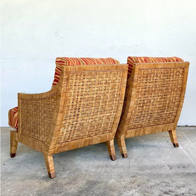 This exceptional pair of "St. Germaine" lounge chairs by the esteemed McGuire Furniture Company showcases the brand's...