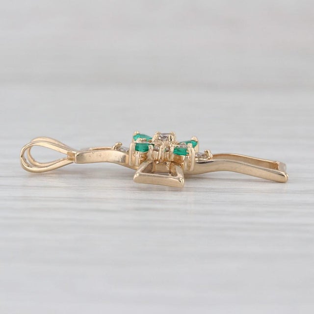 Gemstone Information: - Natural Emeralds - Total Carats - 0.12ctw Cut - Baguette Color - Green Treatment - Oiling -...