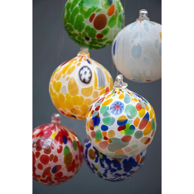 Wonderful Christmas balls for decorating the Christmas tree produced with specks from Effetre of Murano. size 8 cm This...