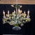 Lovely Hollywood Regency six arm painted white tole floral chandelier with romantic yellow roses and green leaves made in...