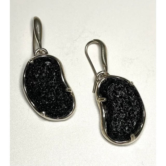 This is part of Chairish’s Costume Jewelry assortment. 950 Sterling (of Brittania Silver) earrings with lava rocks. The...