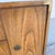 A striking example of Thomasville’s celebrated Huntley Collection, this vintage Campaign highboy dresser blends clean Mid-...