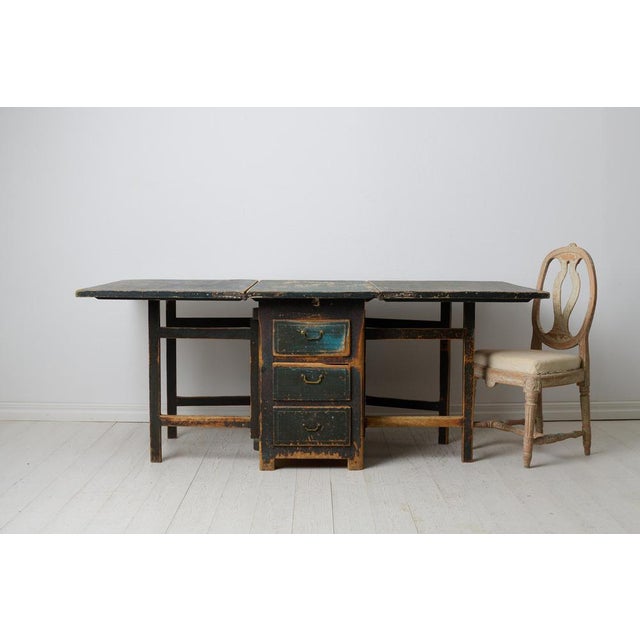Swedish Folk Art Drop-Leaf Dining Table with Drawers and Rustic Paint For Sale - Image 3 of 15