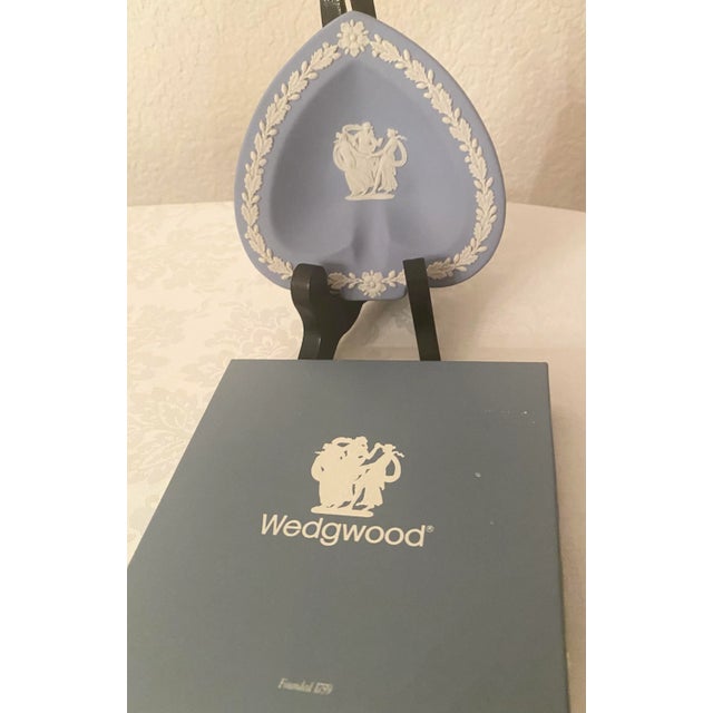 Vintage Wedgwood white on pale blue spade/heart dish. Made in England. Measures 4.5 in length and 4.5 in W and .5 height....