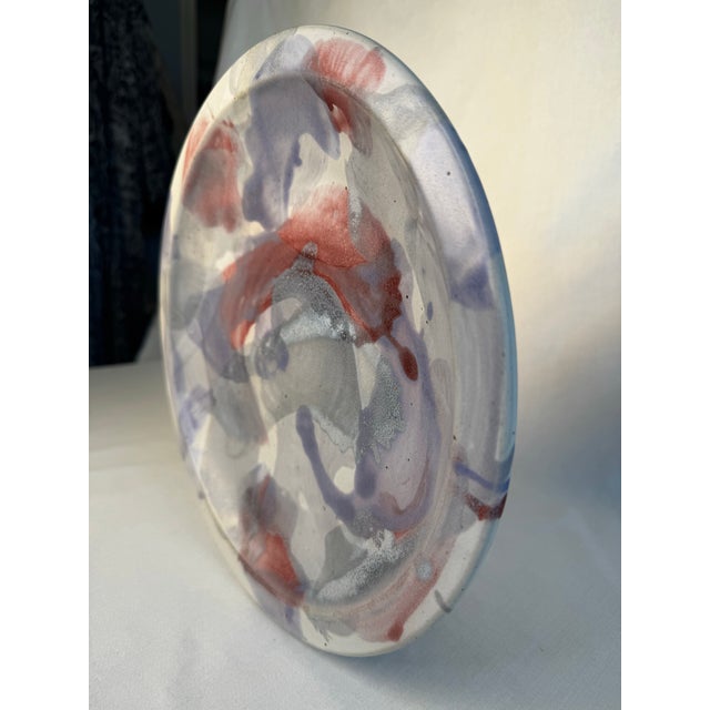The overlapping, organic brush strokes create an organic, almost marbled effect giving this vintage stoneware decorative...