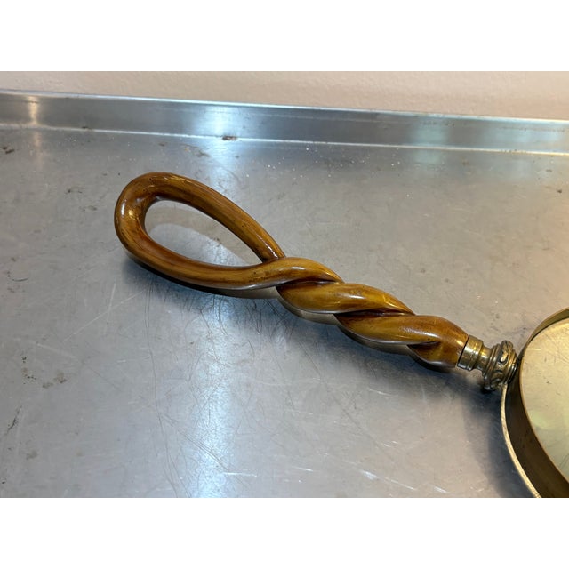 1940s-50s large brass/twisted wood-handle magnifying glass. Excellent condition. Measures 13" long total and 5" diameter...