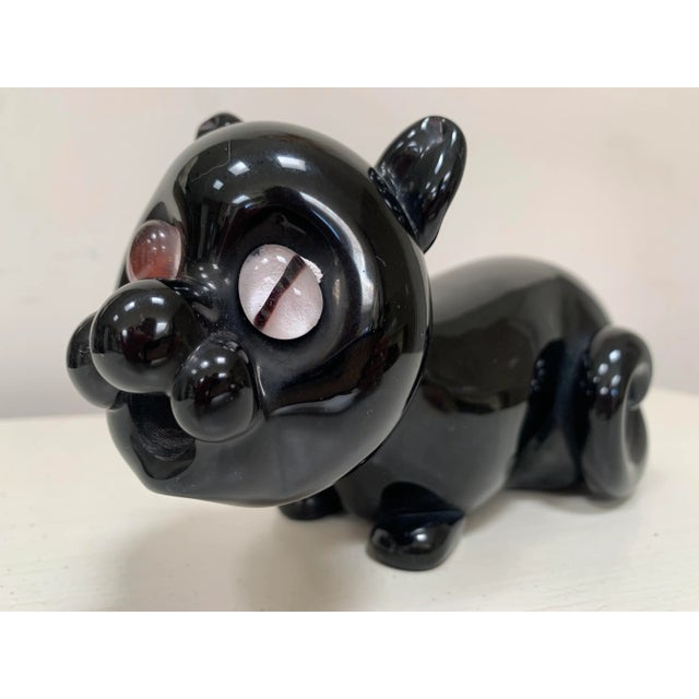 Vintage Murano, black glass, cross eyed cat crouching on the floor. Cat has a curled tail and an open mouth. Designed to...