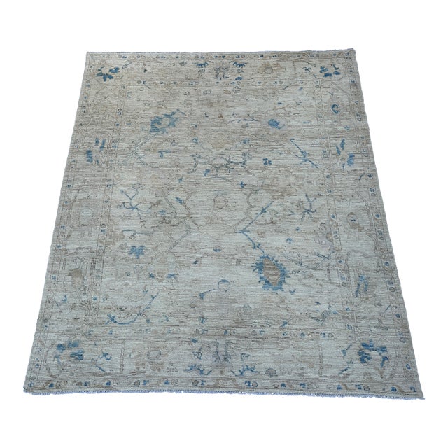 Ivory and Soft Blue Oushak Wool Rug With Floral Border For Sale