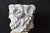 An elegant and finely carved marble bust depicting Janus, the Roman god of transitions, time, and duality. This 20th-...