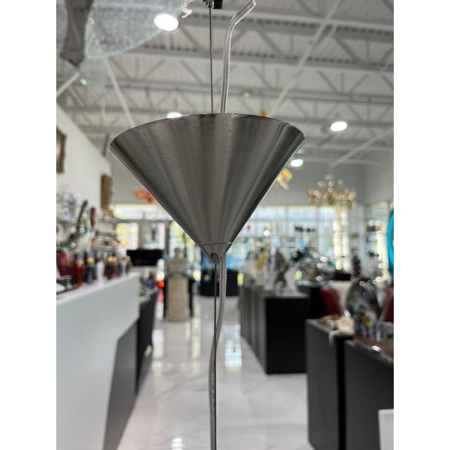 This is a lovely contemporary bullet-shaped piece of blown Murano Glass which functions as an amazing suspension light....