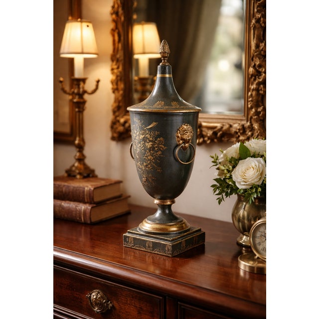 A finely proportioned Regency period toleware chestnut urn and cover of classical design, featuring a decoupaged gilt...