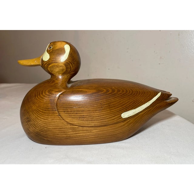 Up for sale is a wonderful vintage hand carved wooden Folk Art duck decoy sculpture by Charles Bruno. It is beautifully...