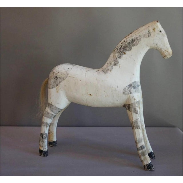 Darling antique Swedish horse in carved wood with original patinated white with gray color. Made circa end of the 19th...