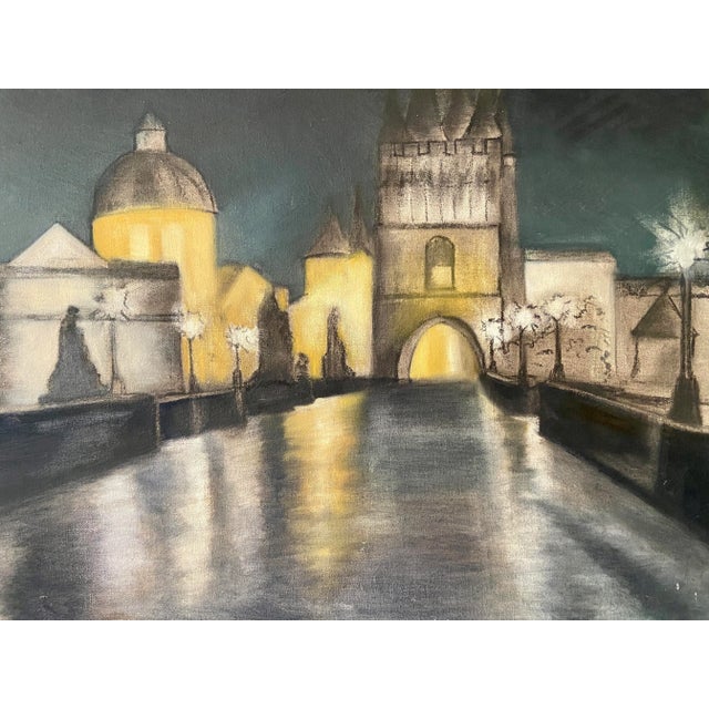 This is an original oil painting by an unknown artist of a body of water running through an ancient city at night. I don't...