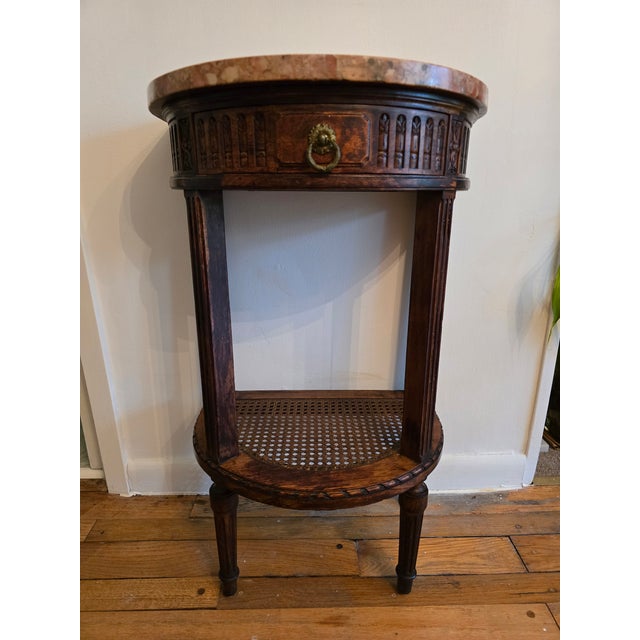 A good antique original console with Rouge royalle marble top ( original ). Having tight Caned design with gilt bronze...