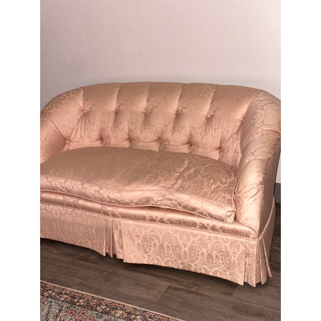 This beautiful vintage Beacon Hill sofa has the classic Hollywood Regency look tufted back, rolled arms, and a pleated...