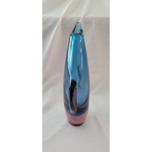 McM Sommerso vase. In a vibrant hue of blue and purple. Polished base, heavy for its size. Resembling a "Penguin", this...