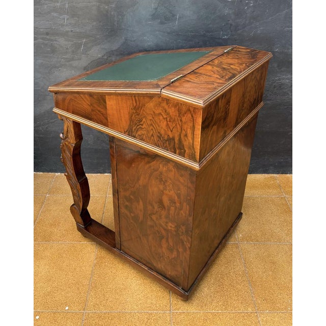 Regency style burr walnut Davenport desk, early 20th century. This compact writing desk features a slanted leather inset...