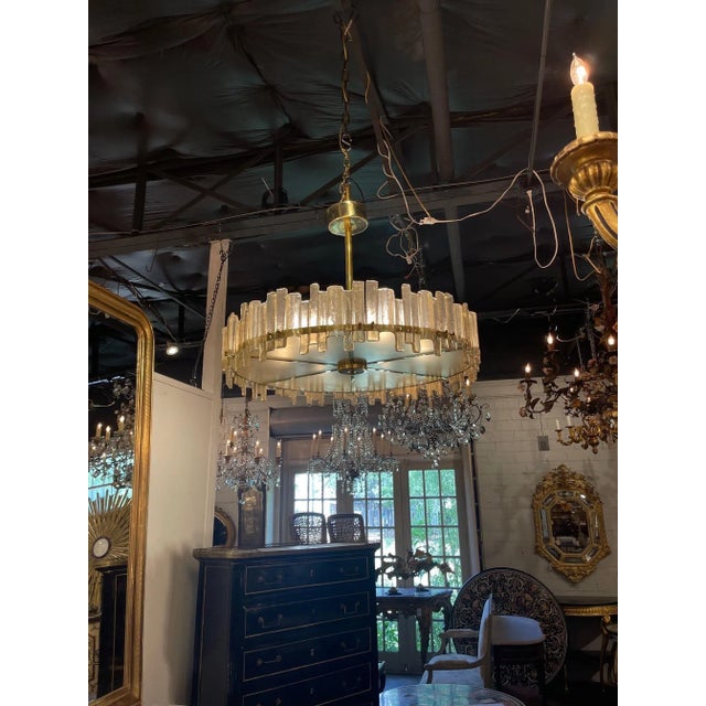 Decorative modern champagne colored Murano glass and brass chandelier. Very fine quality and so unique! Makes a beautiful...