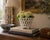 An elegant trompe l'oeil porcelain cachepot crafted in the form of a handwoven rope basket. Executed in glossy white...