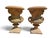 Elegant pair of decorative urns crafted in renowned Impruneta terracotta during the 1960s. Richly adorned with sculpted...