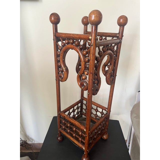 Antique Ornate Steam-bent oak horseshoe arches with hand turned stick-and-ball decorative trim. Brass tack highlights and...