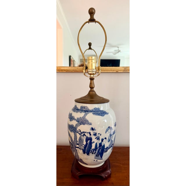 Very elegant vintage blue and white chinese ceramic vase made to lamp. Smooth glazed white background and handpainted...