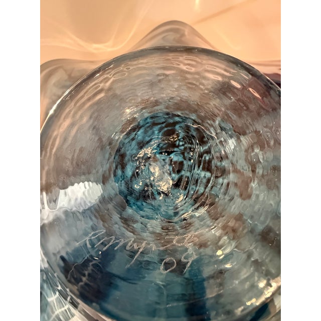 This is a piece of hand blown art glass by Ron Mynatt. Molten glass is used at a temperature of approximately 2300 degrees...