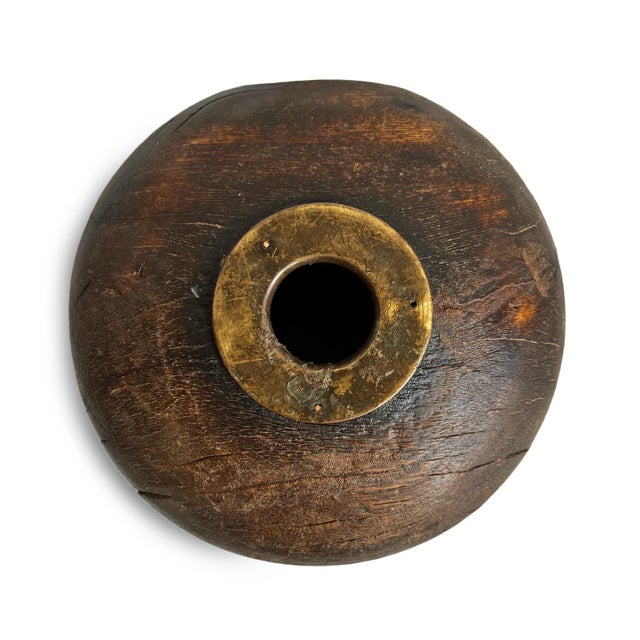 Antique old wooden tobacco container from India. Adorned with brass / metal decorative details. Each is unique and sold...