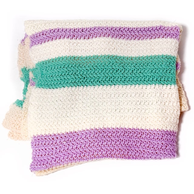 A little handmade happiness in the prettiest pastel palette! This charming vintage crochet blanket features cozy rows of...