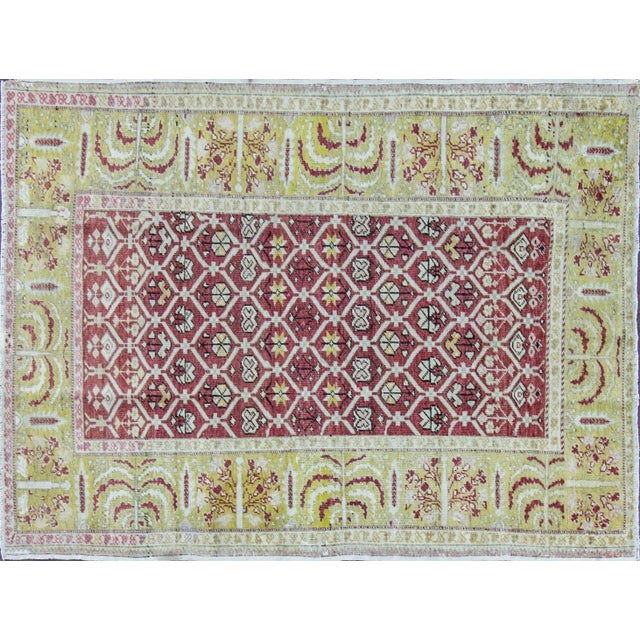 Vegetable dyed wool with zaferan yellow color border that designed with tree and life motives.