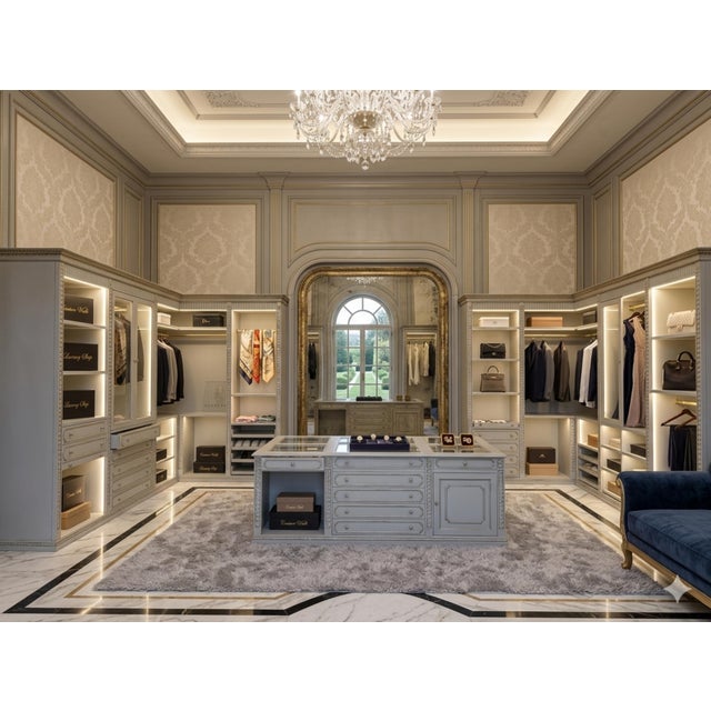 We present a walk-in closet that is a true masterpiece of cabinetry and design. Perfect for those who desire impeccable...