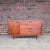 Jens Risom Mid-Century Modern walnut cabinet featuring beautifully figured walnut and sculpted wood pulls. The cabinet...