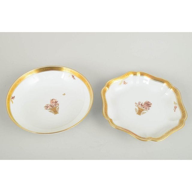 Royal Copenhagen Golden Basket, Two Bowls, 1960s. Two elegant porcelain bowls from Royal Copenhagen’s “Golden Basket”...