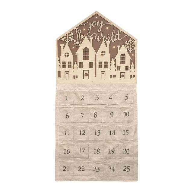 Add a touch of festive cheer with this LED Joy to the World Christmas countdown. Featuring a cozy village outline and a...