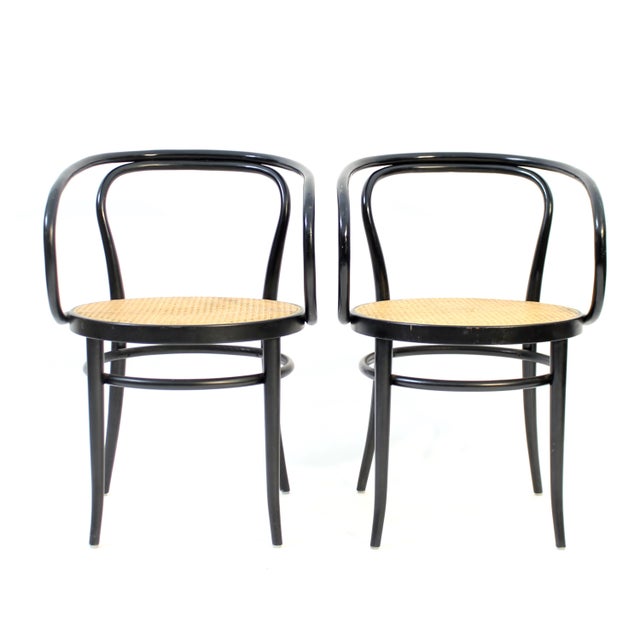Pair of armchairs, model 209 (also called Wiener Stuhl), made by Thonet, one of which is marked. This is therefore a...