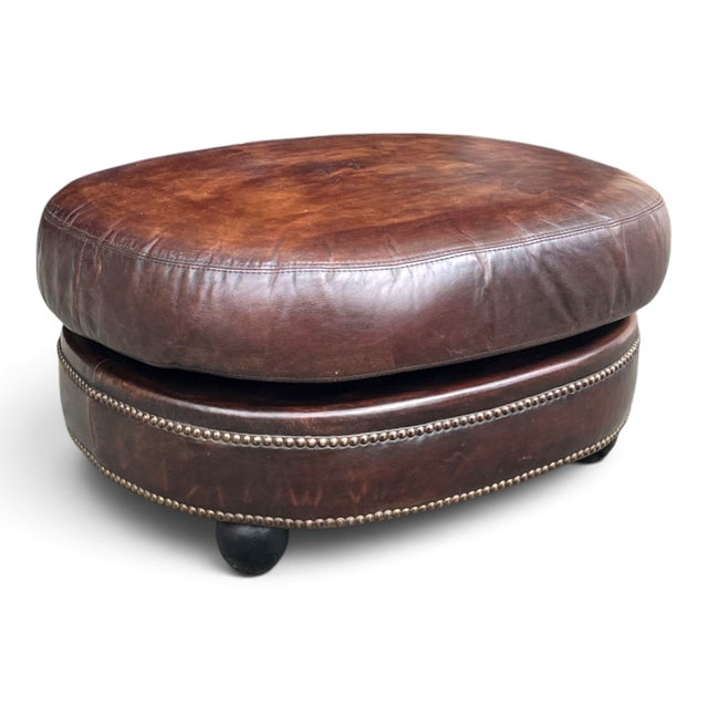 Vintage Oval Brown Leather Ottoman With Brass Nailhead Trim and Rounded Feet For Sale - Image 10 of 10