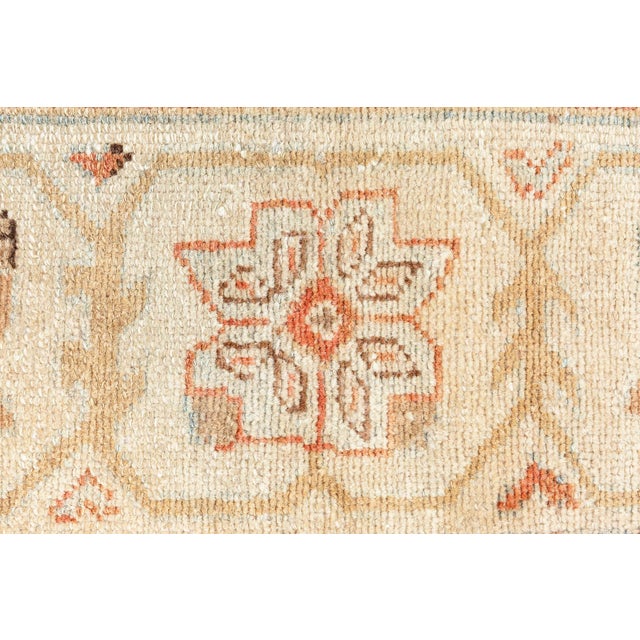 This mesmerizing antique Persian rug was manufactured in Sultanabad, now known as Arak, which was established in 1808 to...