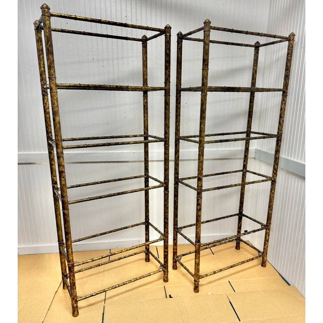 Enhance your living space with this stunning pair of Vintage Mid-Century Faux Bamboo Bookcase Etageres, newly restored in...